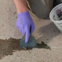 contractor installing epoxy flooring